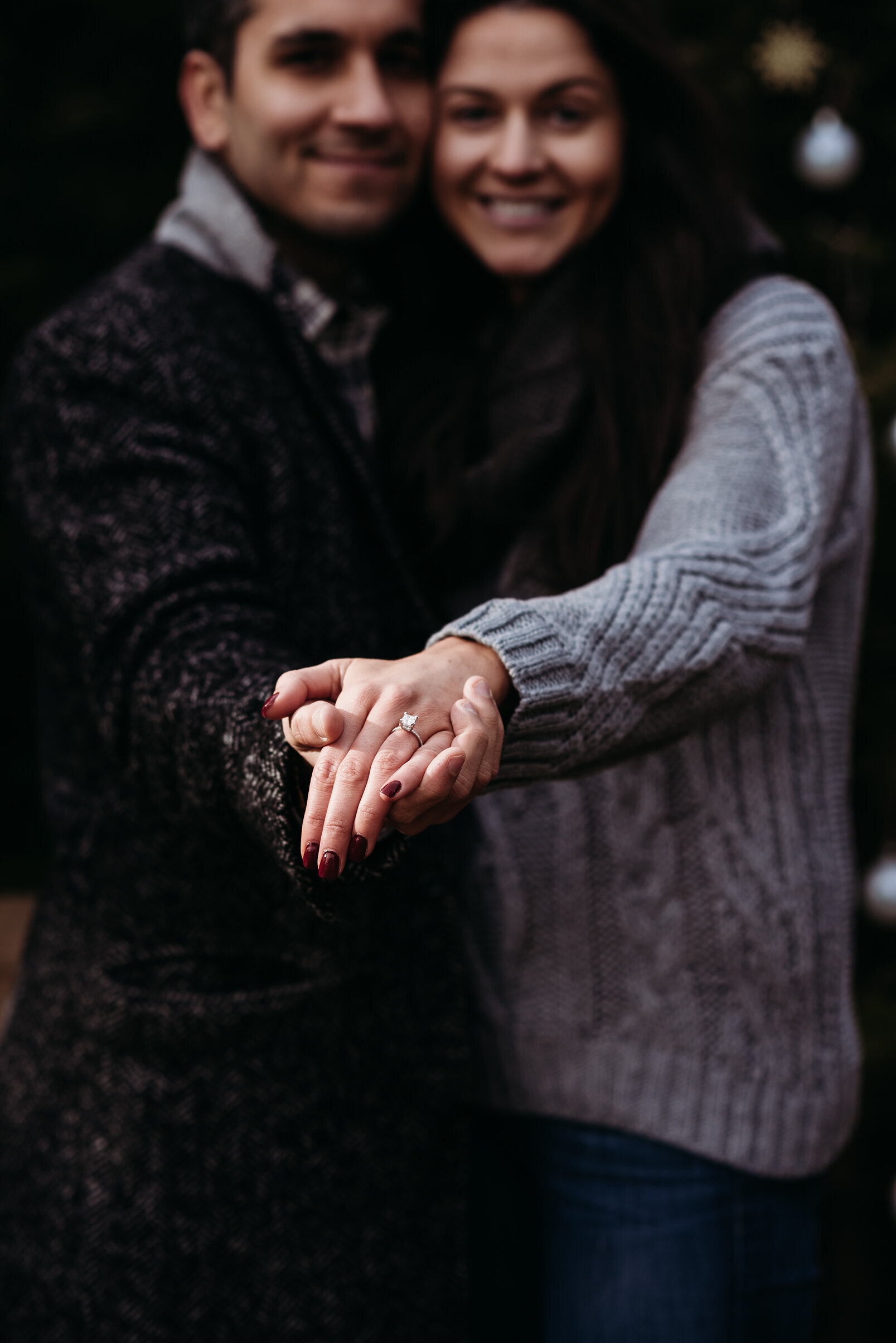 holding-hands-showing-engagement-ring.jpg